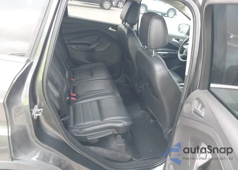 2016 Ford Escape Titanium z USA, uszkodzony, nr VIN 1FMCU0J99GUB82276